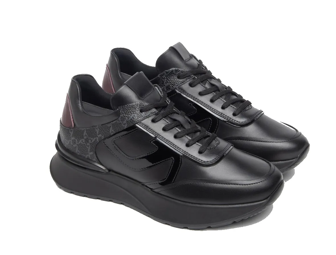 Black leather and patent leather sneakers for women by Nero Giardini, model I308351D/100.