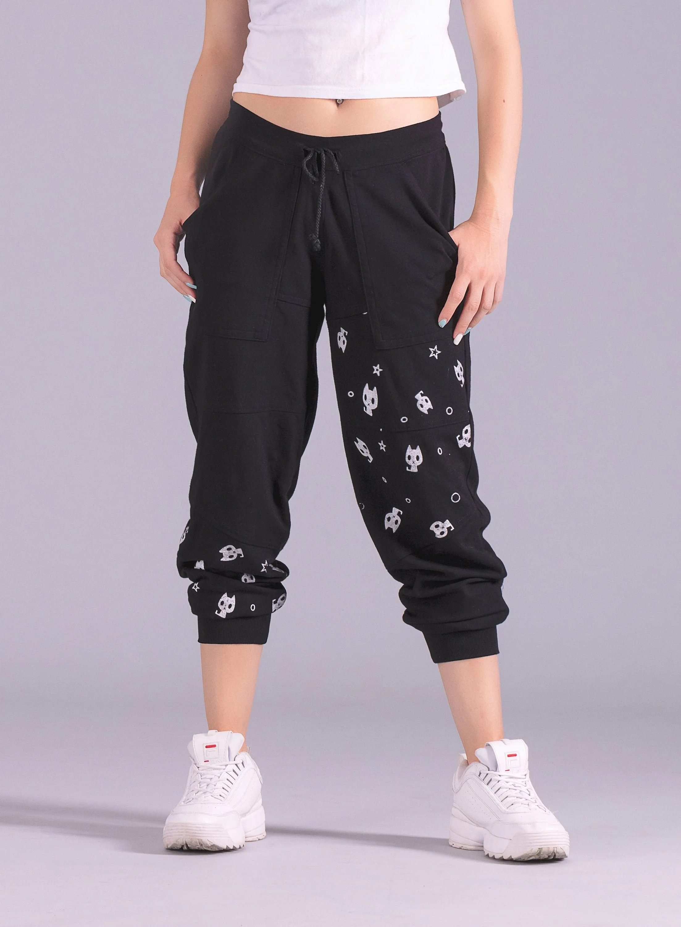 Black relaxed fit joggers with paneled design and unisex X kitty print