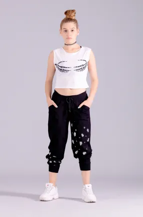 Black relaxed fit joggers with paneled design and unisex X kitty print