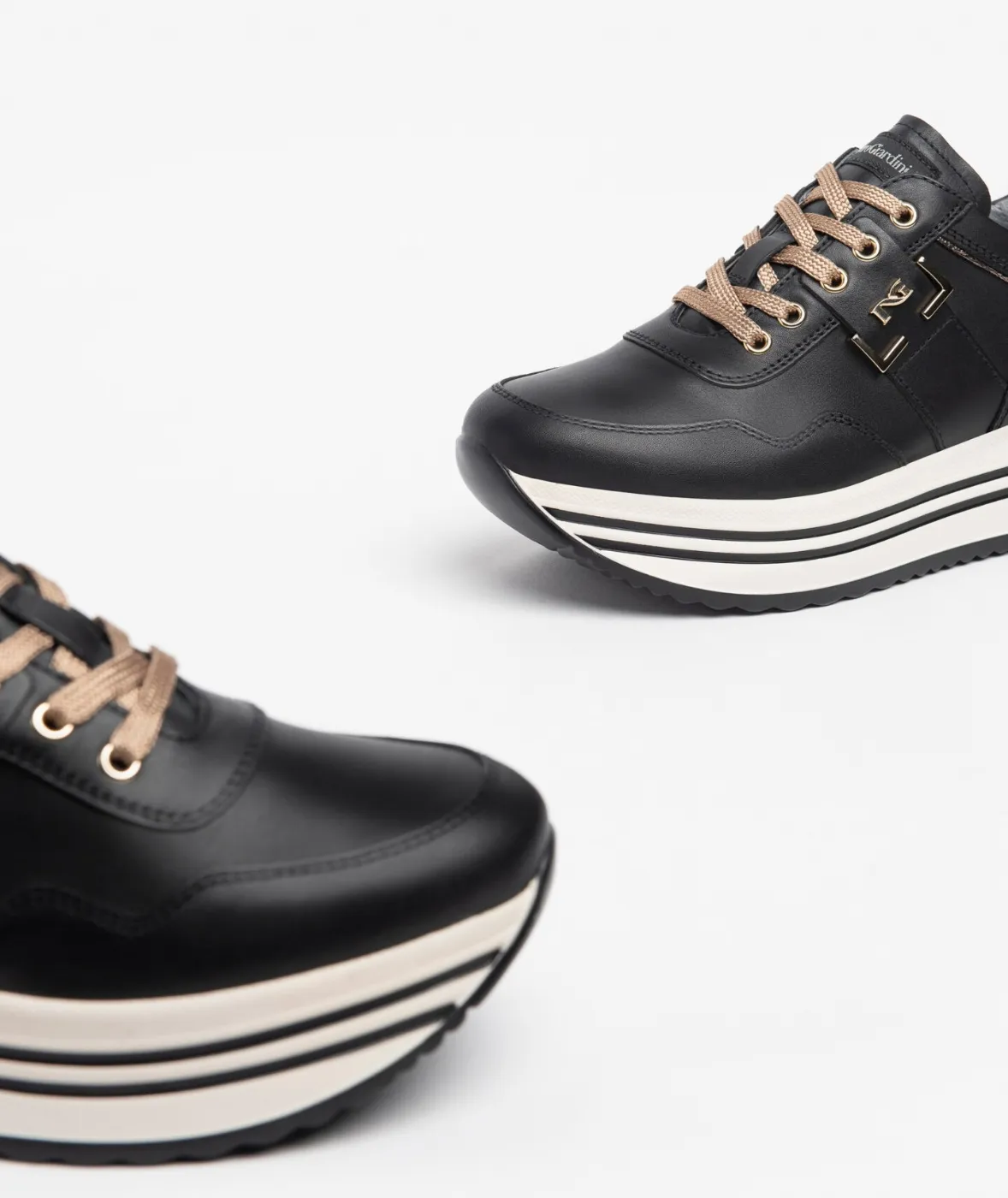 Nerogiardini women's leather sneakers in black (model I308380D/100).