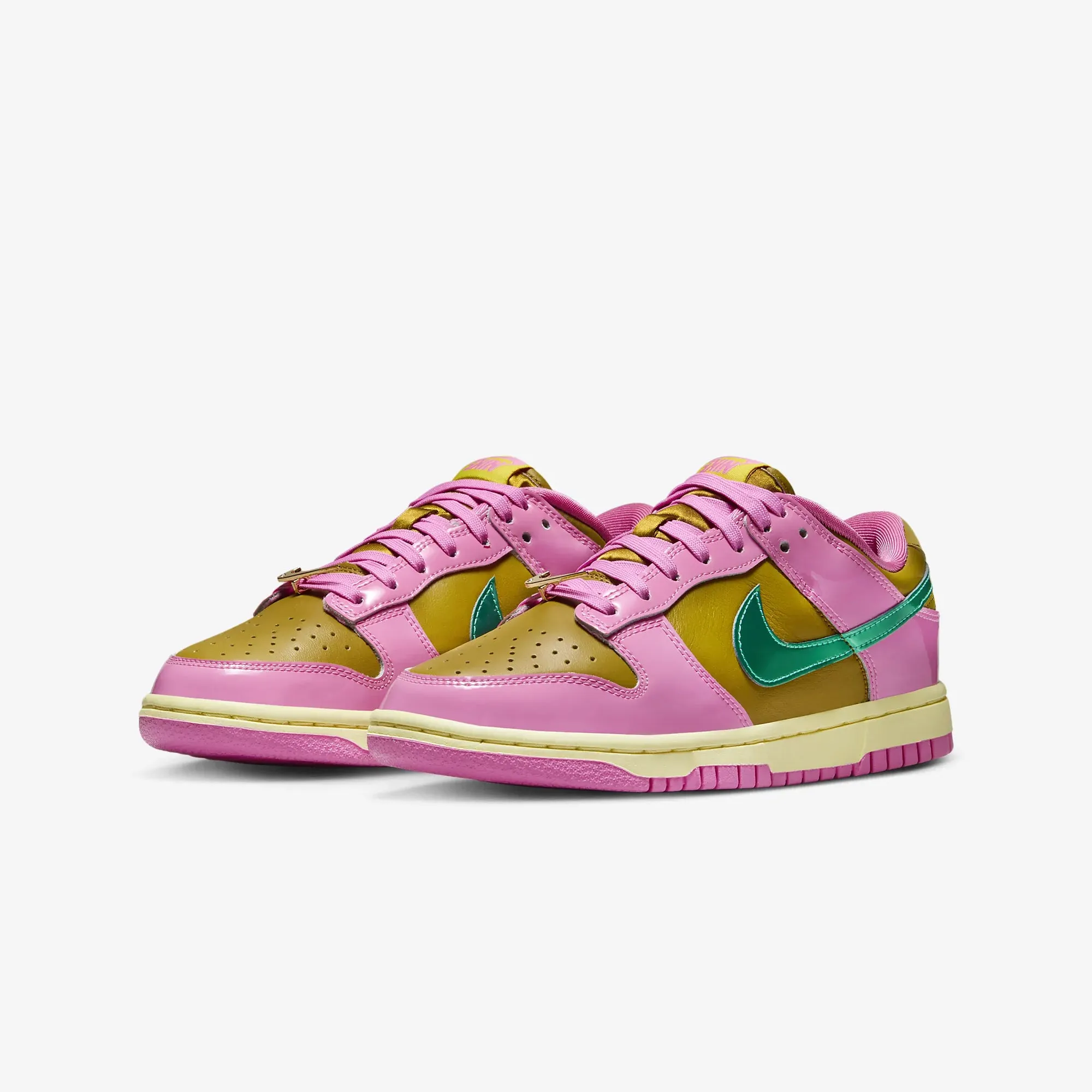 Nike women's Dunk Low X Parris Goebel sneakers in playful pink and multi-color bronzine