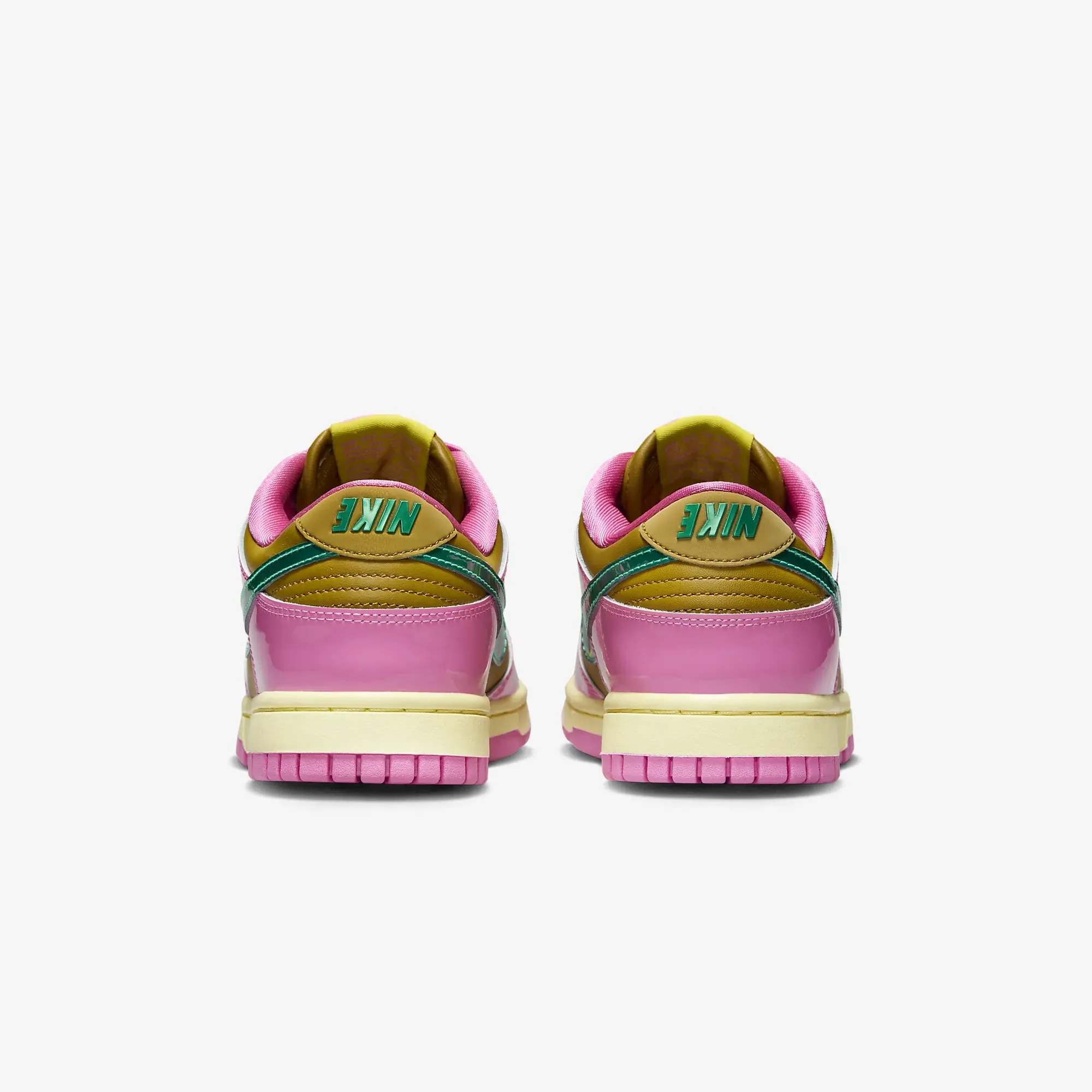 Nike women's Dunk Low X Parris Goebel sneakers in playful pink and multi-color bronzine