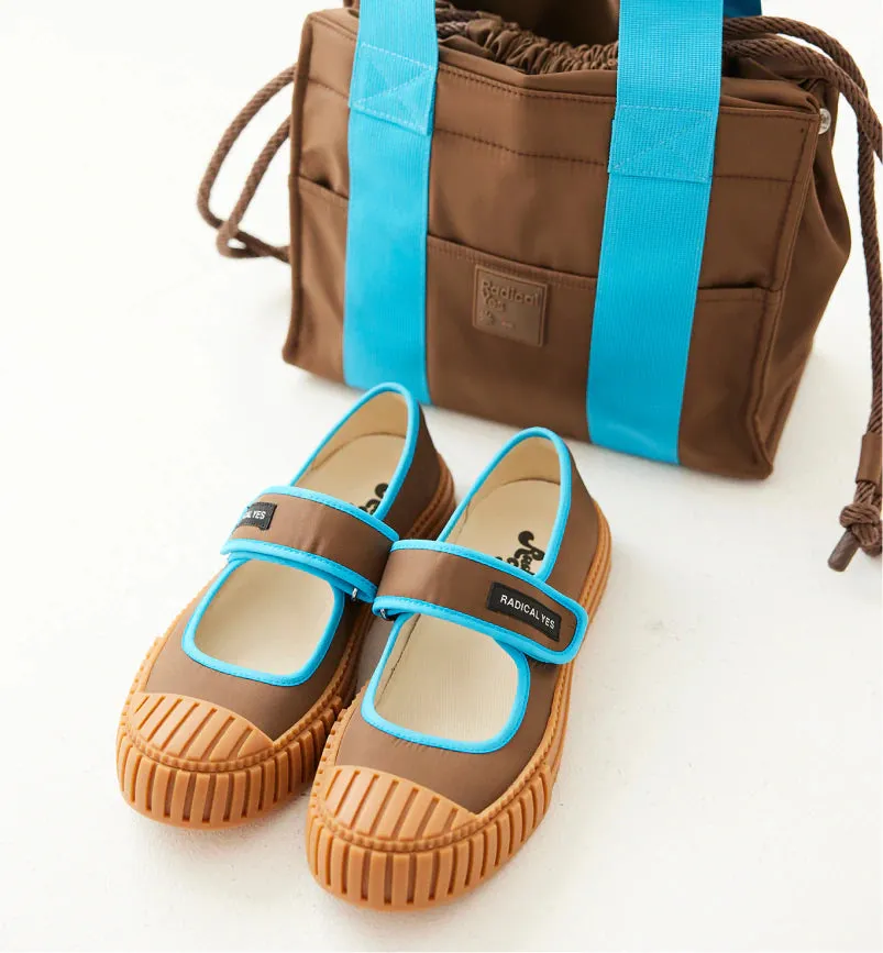 Nutmeg and Turquoise Sea Mary Jane shoes.