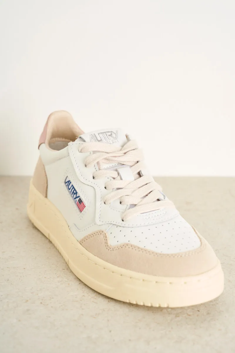 Women's low top leather white and pink sneakers with beige suede.