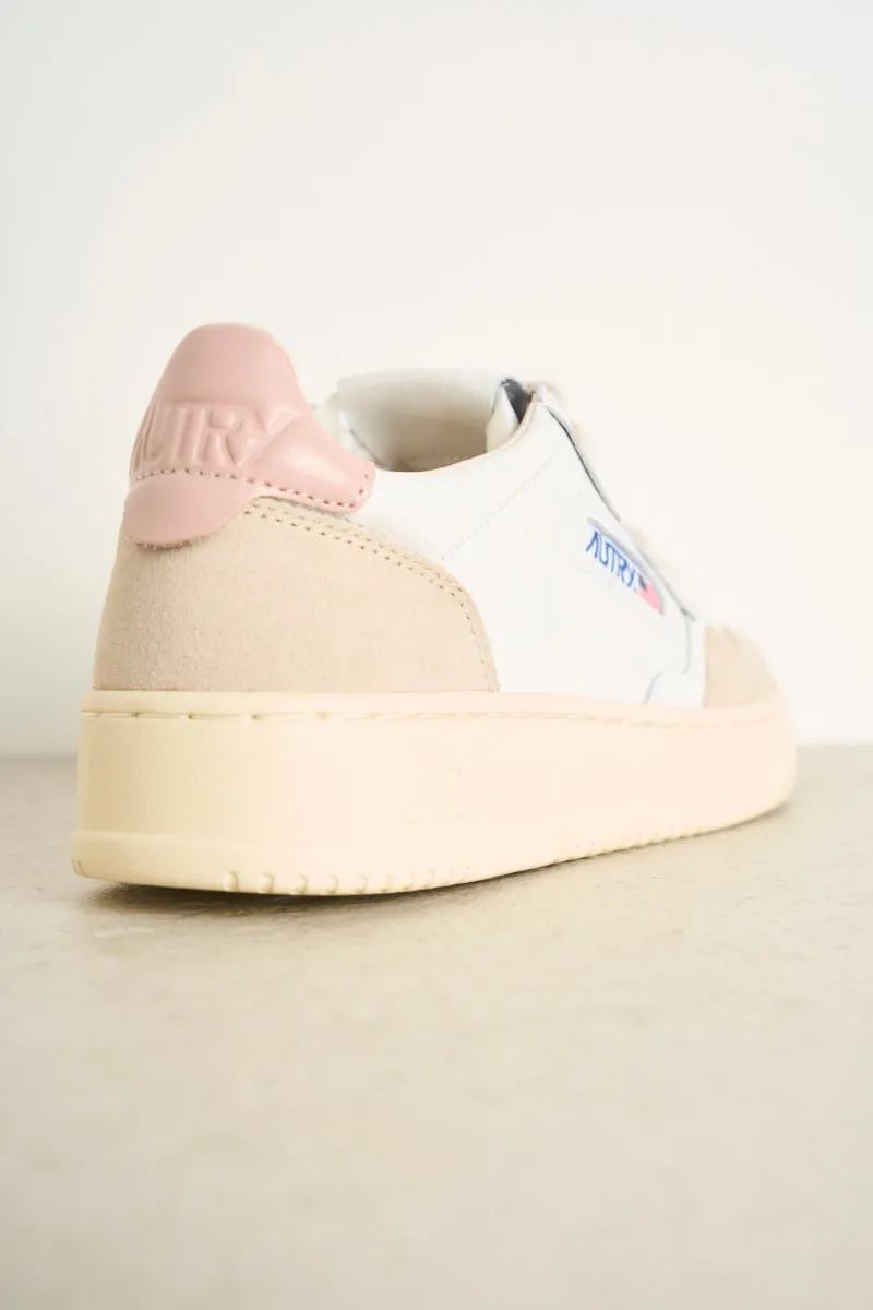 Women's low top leather white and pink sneakers with beige suede.