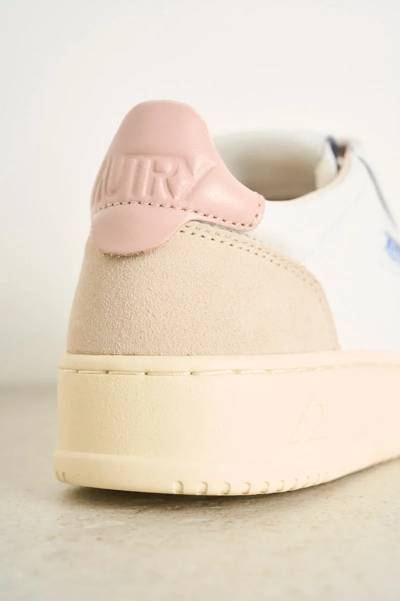 Women's low top leather white and pink sneakers with beige suede.